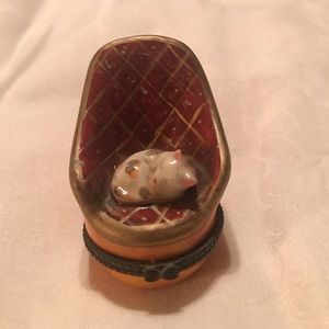 Vintage porcelain cat sleeping in a chair trinket box